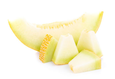 Close-up of chopped fruit against white background