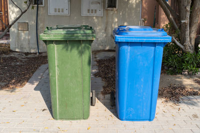 Garbage can on footpath