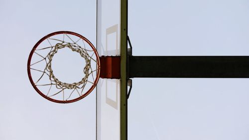 Low angle view of basketball hoop against sky