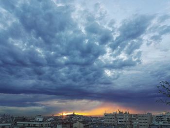 High section of building against cloudy sky