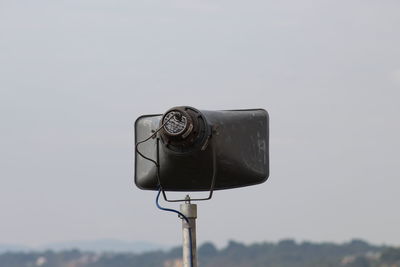 Close-up of megaphone against sky