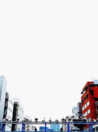 Low angle view of buildings against clear sky