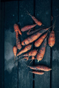 Carrots on wooden background