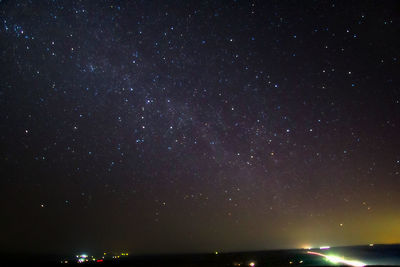 Scenic view of star field against sky at night