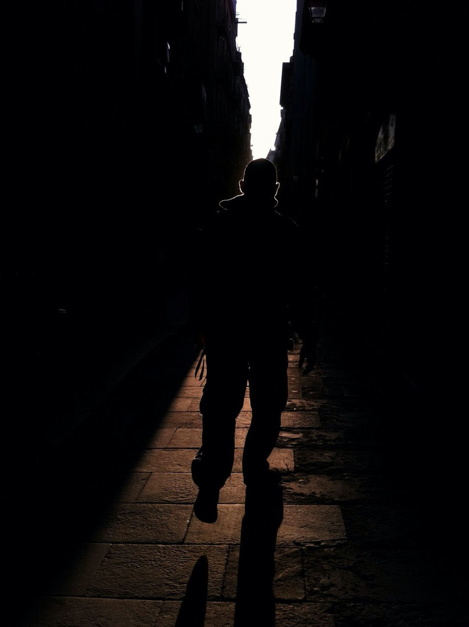 lifestyles, walking, shadow, street, architecture, full length, rear view, silhouette, men, built structure, building exterior, leisure activity, person, standing, sunlight, city life, sidewalk, city