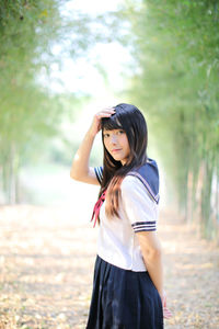 Portrait of young woman outdoors