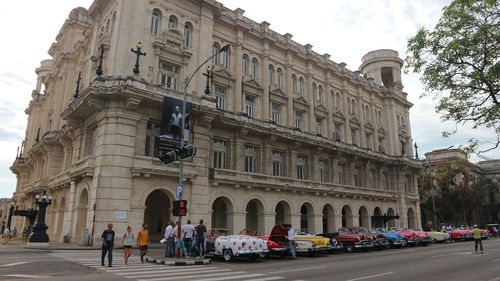 Group of people in front of building