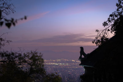 Gargoyle lit by twilight