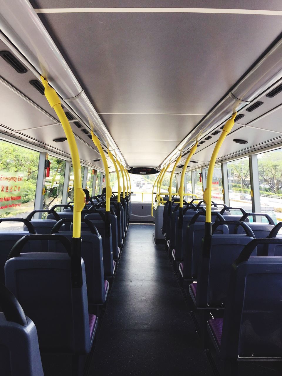 transportation, vehicle interior, vehicle seat, mode of transport, in a row, public transportation, train - vehicle, travel, empty, rail transportation, journey, no people, indoors, illuminated, seat, day, subway train, commuter train