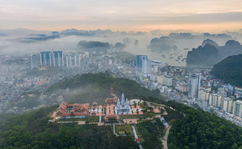 High angle view of townscape against sky during sunset