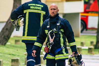 Men standing outdoors