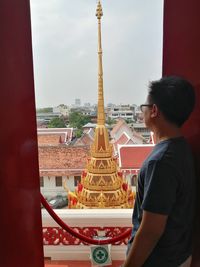 Full length of a temple against building