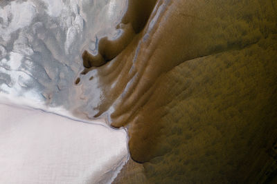 Aerial view of sand formation at river karasjohka banks at the border of finland and norway