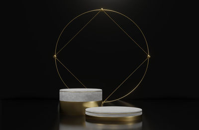 Close-up of illuminated light bulb against black background