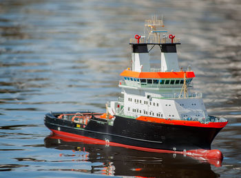 Remote controlled ship model is remote controlled on a lake