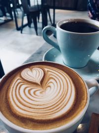 Coffee cup on table