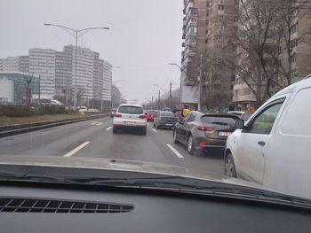 Cars on street in city