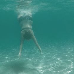 Man swimming in sea