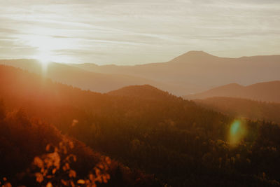 Scenic view of mountains against sky during sunset