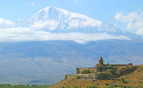 View of fort on mountain against cloudy sky