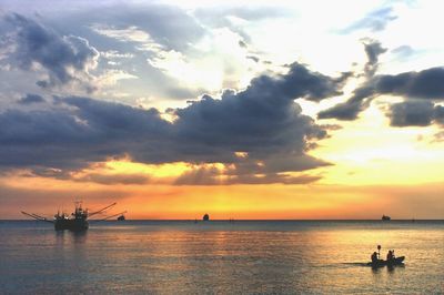 Scenic view of sea against cloudy sky