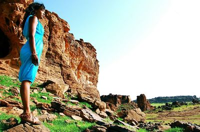 Man standing on rock formation