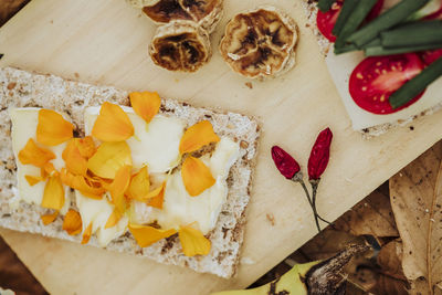 High angle view of fruits on cutting board