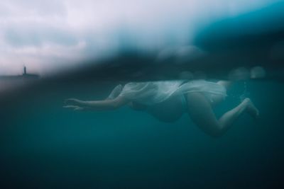 Man swimming in sea