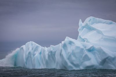 Scenic view of frozen sea against sky