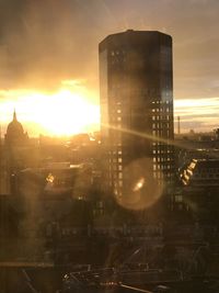 Cityscape against sky during sunset