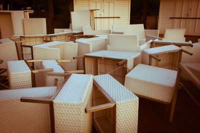 High angle view of empty chairs on floor 