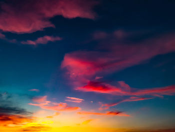 Low angle view of dramatic sky during sunset