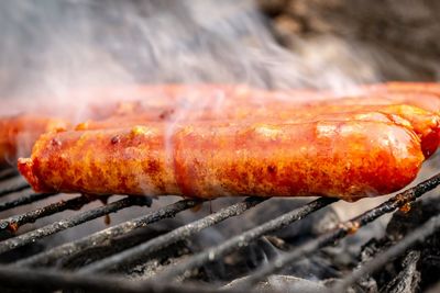 Close-up of meat on barbecue grill