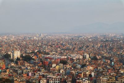 High angle shot of townscape against sky