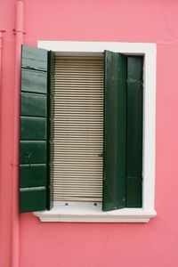 Close-up of closed window of building