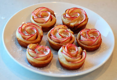 High angle view of apple pies in plate on table