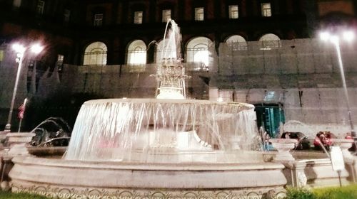 Fountain in front of building