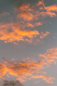 Low angle view of dramatic sky during sunset