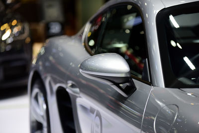 Close-up of car on street
