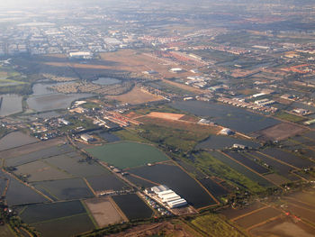 High angle view of river amidst buildings in city