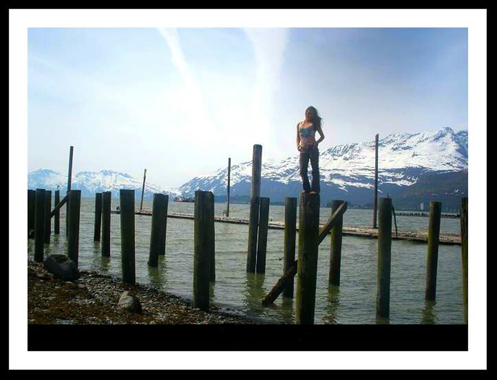 transfer print, auto post production filter, sky, lifestyles, standing, full length, railing, leisure activity, winter, fence, cloud - sky, snow, water, cloud, nature, cold temperature, day, tranquility