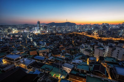 Sunset view over seoul city with view of n seoul tower. taken from changsindong, seoul, south korea