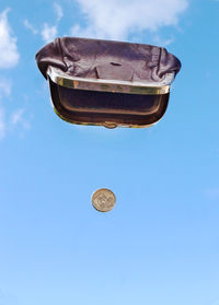 Low angle view of kite against blue sky