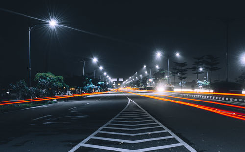 Light trails on road at night