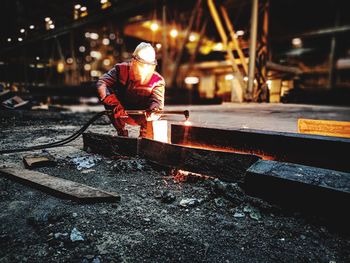 Welder welding at workshop