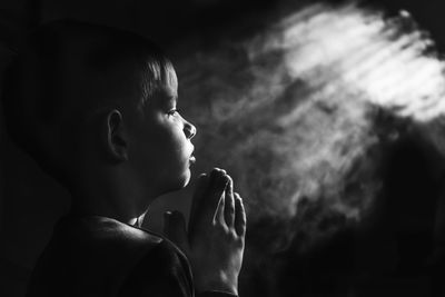 Close-up portrait of boy looking at camera