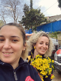 Portrait of happy friends smiling