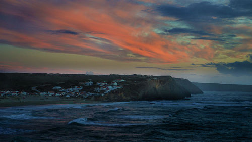 Scenic view of sea against sky during sunset