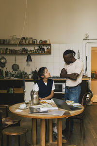 Woman using laptop at home