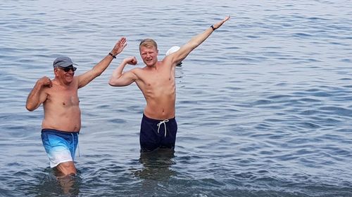 People enjoying in sea